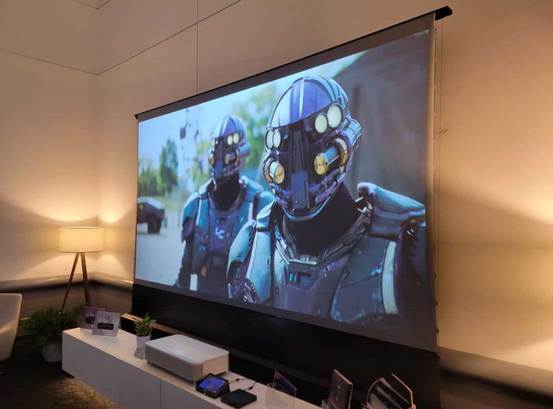 Projection Screen for Custom Installations by EPV Screens EPV Screens® projection screen displaying a scene from a sci-fi movie with two armored characters.
