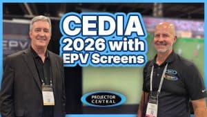 Two men at CEDIA 2026 showcasing EPV Screens projection screens.