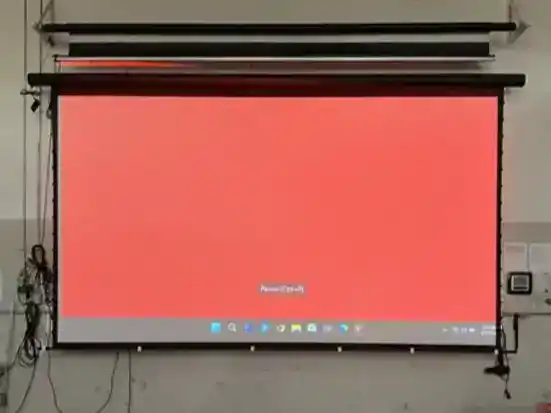 Custom projection screen with motorized roller for home theater or business use.